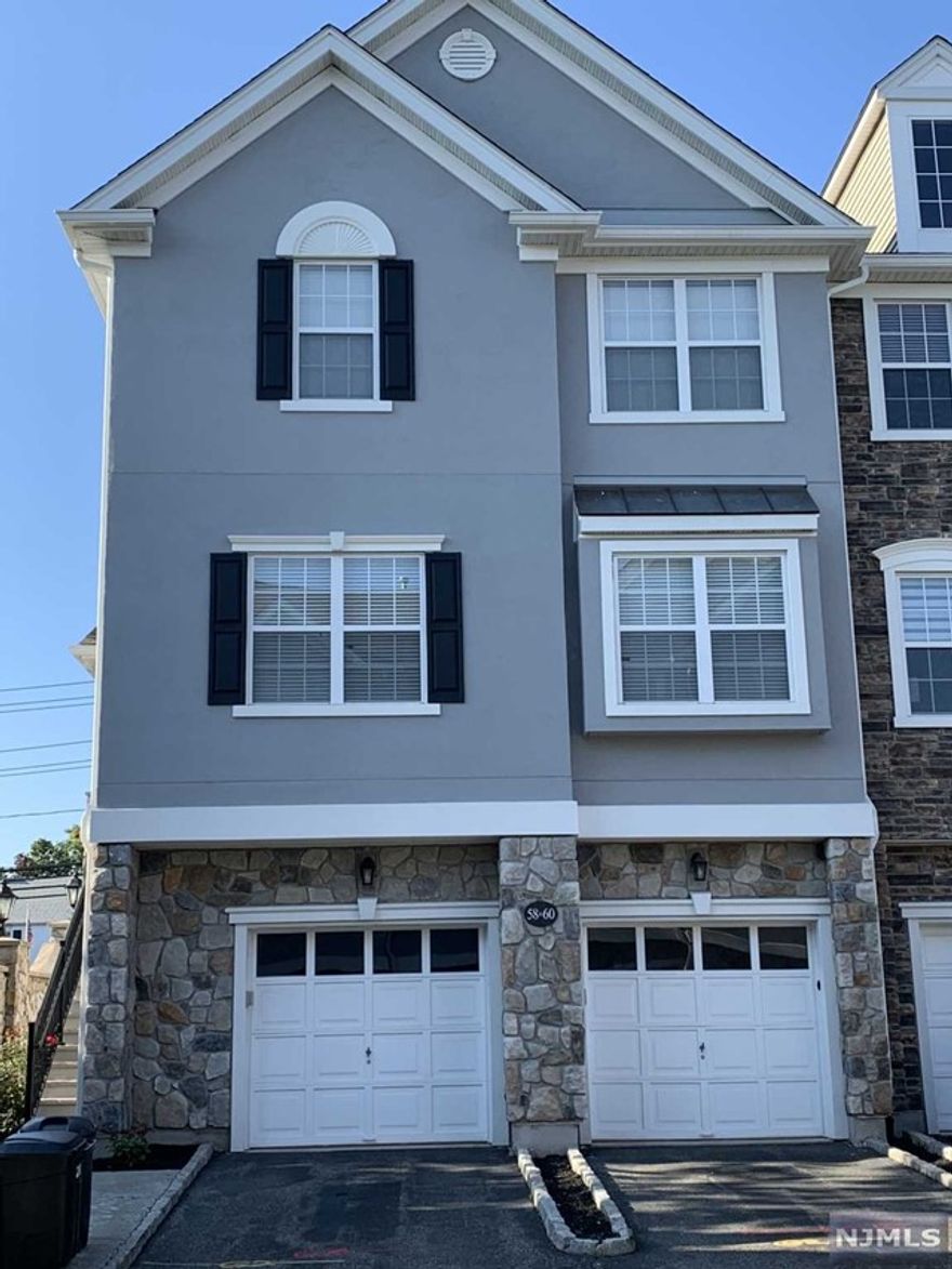 Well maintained and freshly painted townhome in gated community, Cambridge Crossing. This 2 bed, 2.5 bath unit features 1st floor bonus space-can be used as family room, office, den, etc., 2 fireplaces, stainless appliances, hardwood flooring, new carpeting in bedrooms, washer/dryer, plus a garage. Amenities include pool, exercise room, and tennis court - all within close proximity to NYC train or bus & shopping. Small pets under 10lb, ok.