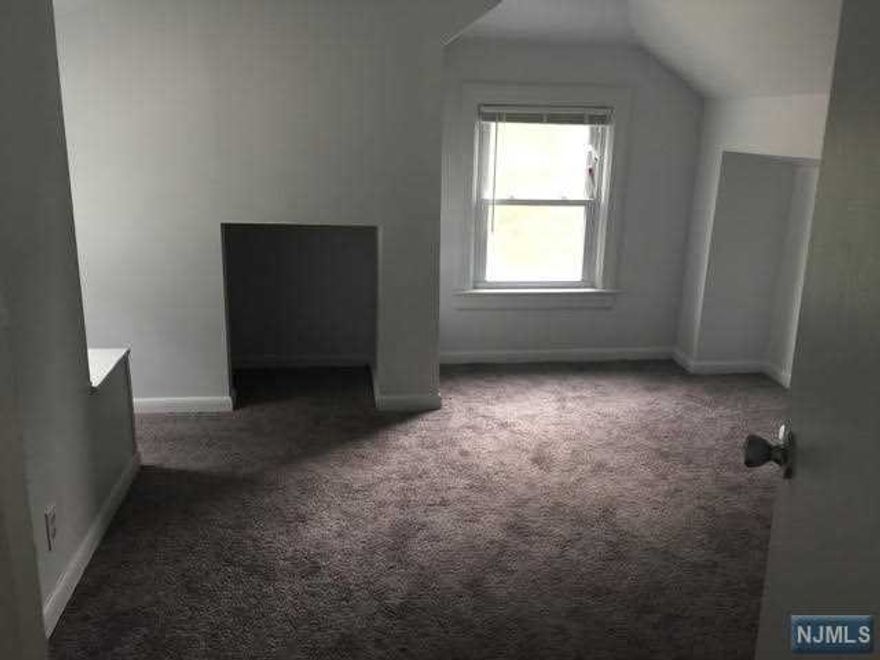 Discover this beautifully renovated 3-bedroom unit located on the second floor . With an updated eat-in kitchen and a bright living room, this home offers a modern and welcoming space. Enjoy the convenience of attic storage, perfect for seasonal items or extra belongings. The property features gas heating and central air for year-round comfort. Two-car parking in driveway. . The yard is accessible for your use, providing outdoor space to relax or entertain. Located near all supermarkets, restaurants and walk to end of block for NYC Bus! This property is perfect for anyone seeking a spacious and updated home. Don't miss the chance to view this fantastic space - schedule a tour today!