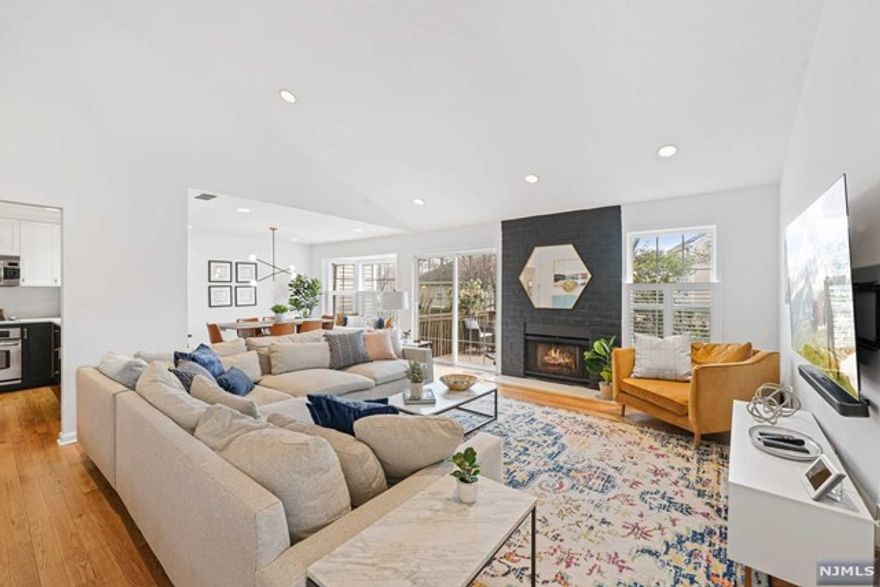 This turn-key sunny, bright and newly renovated end-unit ranch unit with an open floor plan is exactly what you've been waiting for! Enjoy vaulted ceilings, new hardwood floors, stunning bathrooms, a refinished kitchen with high end countertops, gas fireplace, fresh paint, designer fixtures, 2 private decks, laundry in-unit and an attached garage all within a private gated community surrounded by beautifully kept grounds. This community is serious about LIFESTYLE. The amenities include: indoor & outdoor pools, tennis & racquetball courts, gym, sauna, Jacuzzi, clubhouse, conference/meeting rooms, kitchen facilities & play area. Use of all amenities along with exterior maintenance, snow clearance, garbage collection, water is included in monthly maintenance fee. Starbucks across the street and an express NYC bus & Jitney to NYC trains at the front gate.