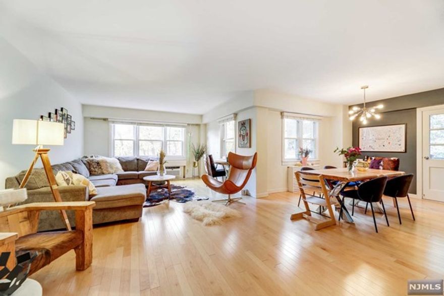 Bright spacious 2 bed 2 bath corner unit with parking. Excellent Montclair location close to all amenities. Wood floors, stainless steel appliances, new AC units, screened balcony overlooking serene greenery, just blocks to downtown Montclair. Rent includes heat and hot water. NYC-bound bus across street.