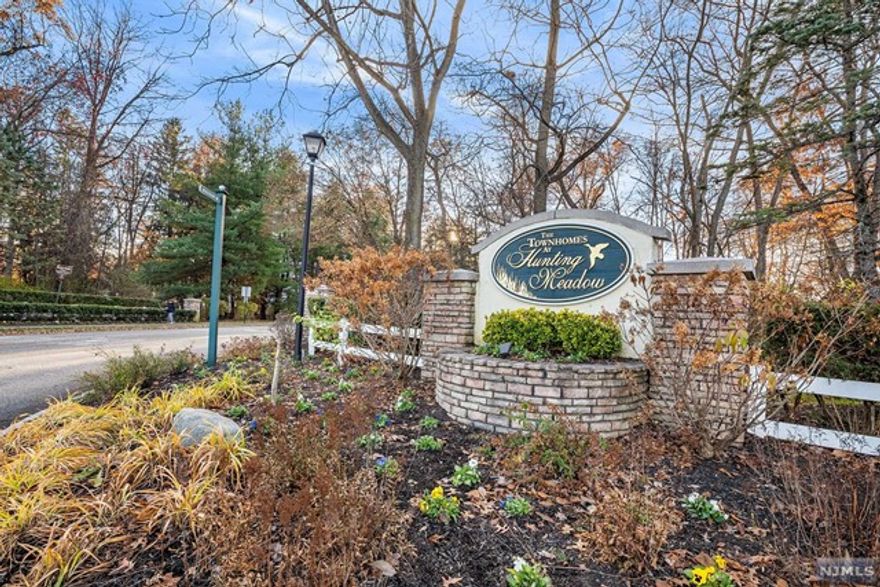 Welcome to this inviting 1st floor end unit nestled in the highly coveted community of Hunting Meadow. This sunlit residence boasts 2BRs, 2BAs, & a detached garage, harmoniously blending comfort w/ convenience. Upon entry, you're welcomed by an airy open floor plan seamlessly connecting the spacious living room, dining area, & kitchen. The kitchen showcases ample cabinetry, granite countertops, & modern stainless steel appliances. The primary suite offers double sinks, a luxurious soaking tub, & a separate shower. The generously sized 2nd bedroom features a walk-in closet. Enjoy added convenience w/ a washer & dryer within the unit. The property also includes a detached garage. Hunting Meadows is renowned for its meticulously manicured grounds, creating a picturesque & serene ambiance. Perfectly situated, this condo provides effortless access to major highways, transportation, shopping & entertainment.