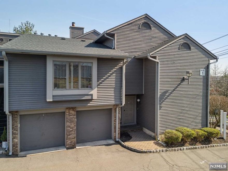 Welcome to this stunning townhome nestled in the heart of Lyndhurst New Jersey offering breathtaking city views and unparalleled elegance. This meticulously designed 2-bedroom, 2 full bath townhome, provides ample space for various lifestyle needs. Step inside and be greeted by the open living concept, with beautiful 12-foot ceilings and large windows that create an airy and spacious ambiance. The kitchen with white custom cabinets, complete with stainless steel appliances, plenty of counter space & storage seamlessly flows into the living room and dining room with 2 large sky lights & slider to the deck. A few steps up leads you to a large bedroom, a bonus room and updated full bath w. tub. The luxurious master suite w. plenty of closet space features a dual vanity, glass shower & modern fixtures, perfect for unwinding, the laundry room completes this level. Easy access to a wealth of amenities, including shopping, dining, entertainment, & transportation option. 15 Mins to NYC.