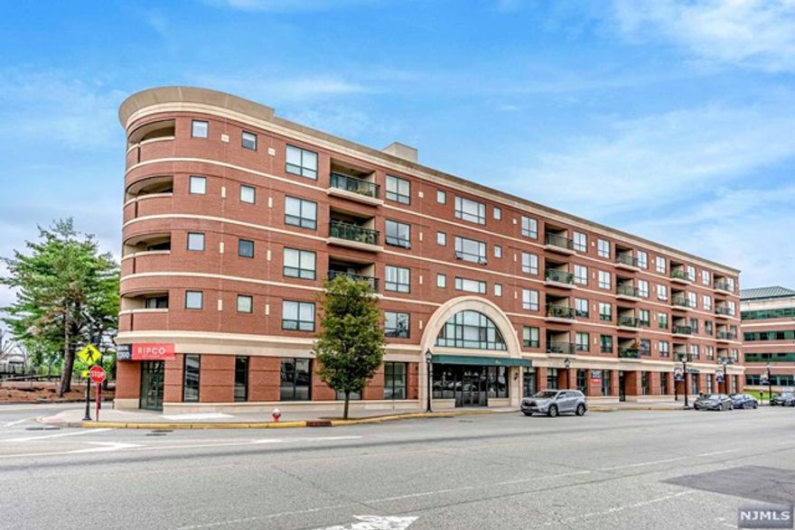 A commuter's dream to live at Station Square in downtown Rutherford. High floor unit facing NYC is a rarity so this is a must see! This light-filled 1320 sq ft 2 bedroom/2 full bath home has amazing NYC views. Spacious open living room/dining room leads to a private terrace. Renovated kitchen with designer backsplash, white cabinets and S/S appliances. Primary bedroom has a big walk-in closet, large bathroom w/ tub, oversized shower and double sinks. The second bedroom can be an en-suite with bathroom and another walk-in closet + laundry. Both suites have large windows to enjoy the expansive views. Elevator building includes one assigned indoor parking space by the elevator lobby-easy entry and exit. This well-maintained building has private storage and bike room. Low HOA includes water, high-speed internet, cable and part-time super. All NYC travel is right there with trains/buses (express every 8 mins). Highways convenient and accessible. Rutherford dining scene is steps away!