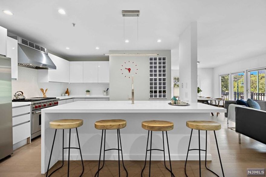 THE CHEN AGENCY (phone 201-346-8888) Are you ready to see something very special? Welcome to Residence 138 at THE PROMENADE. This corner 2-Bedroom with 1510-sf has been completely renovated in a cool modern palette that you will love. A re-mastered floorplan puts an incredible island kitchen with superb appliances at the center of the home. Exquisite materials by Porcelanosa include fine cabinetry, beautiful tile and warm wood. This true masterpiece residence must be seen to be appreciated. A balcony with northern river views, full-size washer & dryer and a garage parking space complete this home on the Hudson. The Promenade is a tranquil oasis with a 24-hour attended gatehouse and is located right next door to City Place providing a vibrant neighborhood with restaurants, shops and services just steps away. Contact NELSON CHEN 201-886-8000, Nelson@ChenAgency.com