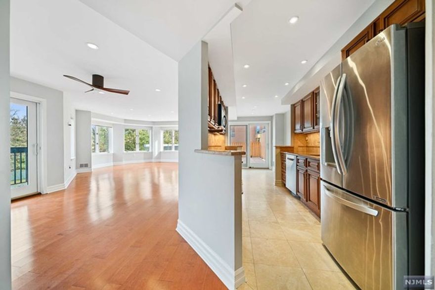 INCENTIVE: LANDLORD WILL PAY THE 1-MONTH BROKER FEE ON A 2-YEAR LEASE - INDEPENDENCE HARBOR - Welcome to 305 Franklin Court. This very rare completely renovated corner unit has 1406-sf plus a huge private upper deck patio that you will fall in love with. Exquisite finish details include wood floors, beautiful cabinetry, stainless steel appliances, stone counters and custom lighting and window blinds. The primary bedroom has a two walk-in closets in addition to the ensuite bath. 2 parking spaces are included. This premier waterfront community features a 24-hour gatehouse, pool, tennis, clubhouse with gym, acres of property & direct access to the Hudson Riverfront Walkway. All this with convenient access to NJ Transit. DUE AT LEASE SIGNING: 1st month rent, 1.5-month security, $500 building moving fee. There is also a $500 refundable moving day damage deposit to the building. If less than a 2-year lease, tenant pays 1-month broker fee. No smoking inside apt.