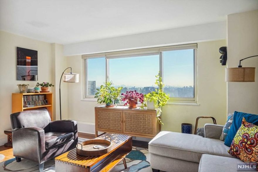 Renovated co-op offers unobstructed views from all your living spaces. New stainless steel kitchen appliances, bamboo flooring, contemporary lighting, and new heating/cooling systems " move right in and start living. Shuttle service to the train station, a well-equipped gym, and easy access to hotspots like SOPAC, NJPAC, and the Prudential Center. Access to major highways and Newark International Airport. Relax in the building's garden or on the charming patio. The attentive staff takes care of landscaping and package delivery, freeing up your weekends. The monthly maintenance fee covers property taxes, utilities, and building maintenance. This means no unexpected utility bills and more time for the things you love. Board approval and a minimum 20% down payment are required. Don't miss this opportunity for luxurious living with breathtaking views.