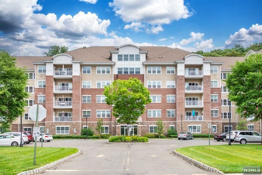 Welcome to Wanaque Reserve- 55 and better, active adult community. Stunning Colfax model located in desirable building 1, including 1,768 sq ft, 2 bedrooms and 2 full baths: all perfect and ready to move right in. Home features: Gourmet eat-in kitchen with stainless steel appliances, granite counters and custom backsplash. Formal living room and dining rooms, den/library, primary bedroom with a tray ceiling, walk-in closet and full private bath. Crown molding throughout most of the home, hardwood floors, granite countertops in bathrooms, recessed lighting, neutral colors and private balcony. Live life to the fullest at the Wanaque Reserve with a 20,000 square foot clubhouse: indoor & outdoor pools, club house, gym, billiards, art room, theater, tennis, 40 clubs and much more! Close to major highways and NJ Transit.