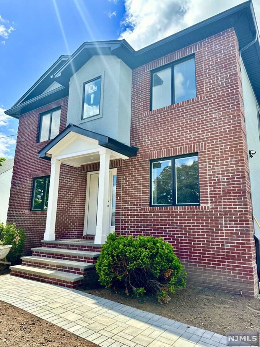 Come and See this Wonderful and Spacious 2nd Floor Apartment. One of a Kind on the Quiet Residential "Top of the Hill" Section of Wallington. Rental Offers Huge Modern Living/Dining Room with Open Kitchen, Stainless Steel Appliances and Granite Countertops, as well as Hardwood Floors Throughout the Apartment. Features Master Suite with Walk-in closet and Master Bathroom. Totals 3 Bedrooms and 2 Full Modern Bathrooms, Laundry Room with Washer and Dryer included. Central heat, AC, Vacuum and shared use of backyard. Two parking spaces in the driveway. Don't Miss this Great Opportunity! CALL NOW TO SCHEDULE YOUR APPOINTMENT TO SEE THIS WONDERFUL UNIT!!! Owner is related to the Listing Agent.