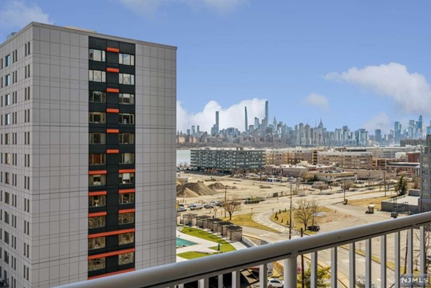 This spacious 1,936 square feet of living space, 3 bedrooms, 2.5 baths, and a private garage is located within the gated community at Legend Hills. This home offers a beautiful view of NYC from both the balcony and the master bedroom. The living room flows seamlessly into the dining room with an open Kitchen layout and a whole separate family room for entertainment. Upstairs offers a master bedroom with stunning views of NYC and a walk-in closet. Two additional bedrooms, one full bathroom, and a wash and dryer are all located on the second level. The private, attached 1 car garage offers plenty of extra storage space, in addition to the two additional parking spots right outside the unit for residents to use. This condo is conveniently located 10 minutes from the NYC Ferry, 8 minutes from the bus, and stores and restaurants.