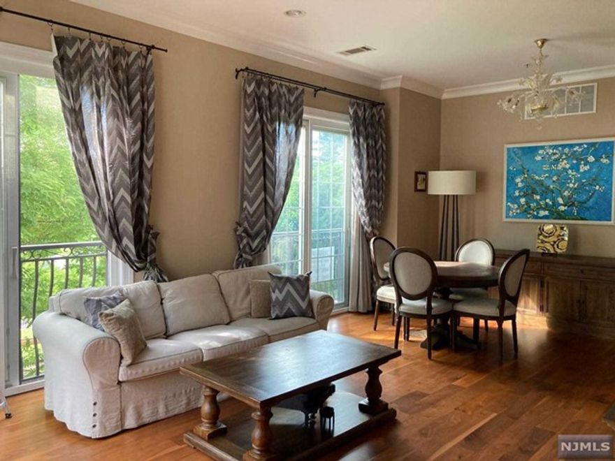 The Plaza at Tenafly, gated Community with club house/concierge/game room/business center/kitchen/gym/ heated pool/grill area, community events for residents. Luxury, 2nd floor, very bright 2b 2b corner unit, 10ft celling, hardwood floors, modern kitchen/ss Viking appliances and granite counters, 2 large bedrooms, 3 California closets (2 are walk-in), 2 full baths with linen closets, in unit Wash/Dry. Included one indoor & one outdoor parking spaces, NYC transportation half a block away (express bus), walking distance to schools (Maugham, TMS, THS)