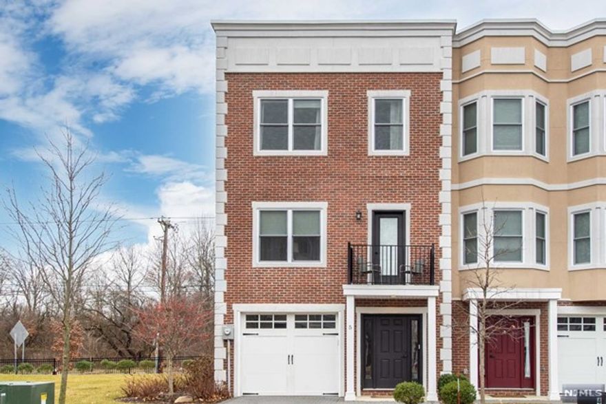 Welcome to the Brownstones at Fairfield. Only 4 years young! Enjoy 3 levels of spacious living! Upon entering, is a large foyer, garage entrance, laundry room, storage closet, and access to back yard. 2nd floor offers an open layout, featuring an all white kitchen with wood shaker cabinets, quartz counters, built in pantry, and large quartz center island with seating for three. A sizable living room and powder room as well, but before you head upstairs, take in a breath of fresh air on the balcony looking over the entire Brownstone community. Beautiful solid oak handrails will take you to the 3rd floor where you will find 2 ensuites. The master has 2 closets with custom built ins. , lavish master bath including large shower, with oversized ceramic tile walls, floors, and quartz countertops. The 2nd ensuite offers a tub/shower, ceramic tile with quartz counter, and closet with custom built ins. This end unit offers large windows with plenty of natural light.