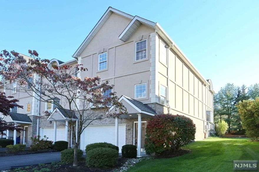 Welcome to this spacious & sun-filled end unit in the coveted Townhomes At Olde Woods. Upon entry, you are welcomed into the large foyer with soaring ceilings. Ten steps up brings you to the open concept main living area which includes a formal living room, formal dining room, powder room, updated kitchen, 2nd eating area & family room with gas fireplace. There are sliders that lead to a lovely deck overlooking a lush yard. Upstairs find 2 large bedrooms, the hall bath & a master suite complete with two walk-in closets & a spa-like bathroom with a jetted tub, double sinks & walk-in shower. The lower level has a 2nd family room has custom woodwork & bar area, full bath, laundry & built-in sauna. you can access the two car garage from this room or the front foyer. Other features include: all new drywall, brand new gleaming hardwood flooring, custom blinds, bay windows & freshly painted walls. You will not be disappointed!!