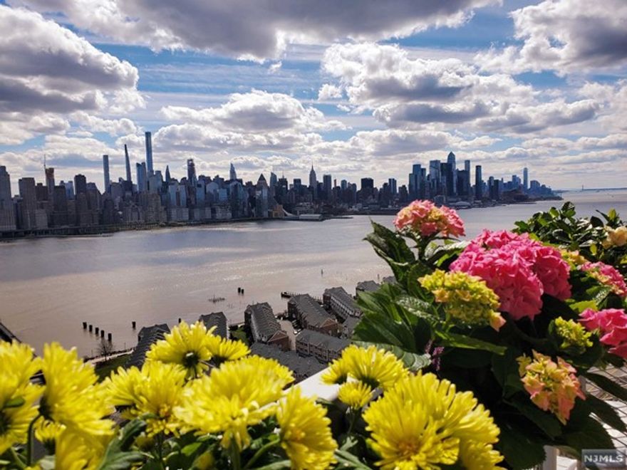 Location! Safe, quiet and clean highrise with full amenity. Breathtaking NYC skyline and Hudson River views from every window and the large terrace. Easy and quick commute to NYC and access to abundant local dining/shopping, Whole Foods, Trader Joe's, Mitsuwa, ACME and so much more! Walking distance to parks, lake, jogging trails, tennis and basketball courts. Monthly fee includes all utilities(except cable and parking) and RE taxes and is tax deductible. Co op Building has financial requirements, please call or email for details.