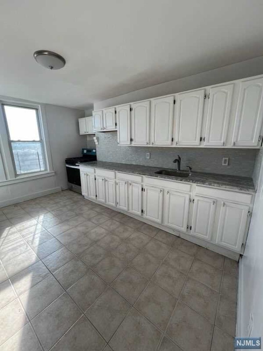 NEWLY Renovated 3 Bedroom /1 Bath available for an immediate move in! This 3rd Fl Apartment features an oversized Master bedroom with 2 closets and an office/seating area. 2 Queen sized bedrooms with 1 closet each. A large walk-in closet/linen closet. Updated kitchen with stainless-steel appliances. New Vinyl flooring throughout, overhead lighting, and modern fixtures. Minutes away from Rt 21 & I-78. Walking distance to local restaurants and schools. Plenty of Street Parking. Tenant pays all utilities. Owner responsible for water and trash. No pets allowed. Verifiable Income and Credit Report Required.