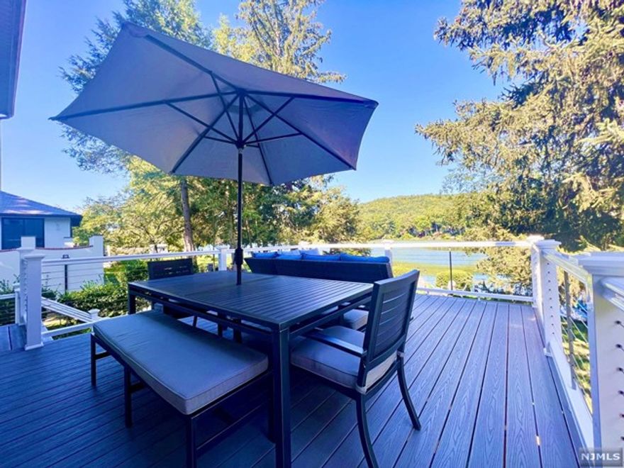 Lake front property just 40 mins from NYC! This beautiful FIVE bedroom home has been fully renovated including two gutted bathrooms. The spacious fully equipped kitchen over looks the beautiful lake and comes with a dishwasher and plenty of counter and storage space. Your backyard on the lake has its own private dock which makes this home the ideal choice to make you feel like you're on vacation all year round. Fully furnished with plenty of room to add your own personal belongings and furniture, this house is an unbeatable value. Enjoy your morning coffee on the expansive deck, spend your lazy afternoons lounging by the water's edge and with direct access to the lake, you can swim, kayak, paddleboard or even embark on a boating adventure. The town of Oakland boasts an amazing community and school systems while it's conveniently located close to shopping centers, parks, major transportation routes and finally a private beach. Don't miss this opportunity!