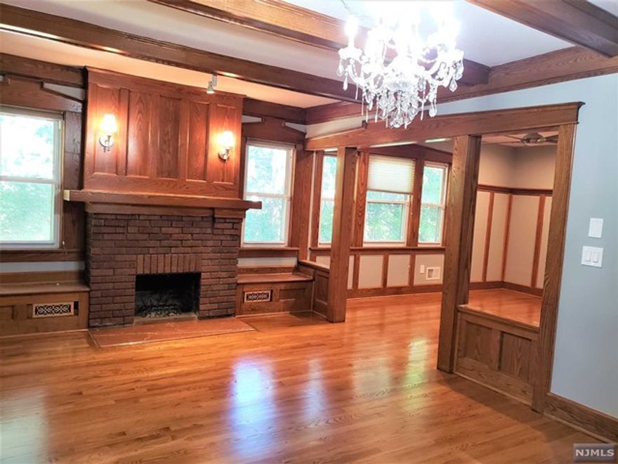 Beautiful and spacious Apartment on the First Floor with Working Fire Place. Very Bright and Renovated with Granite Countertop and Hardwood Floor. Kitchen have a Stainless Still Appliances. Use of the Back Yard and Basement for Storage. Parking available with rental.