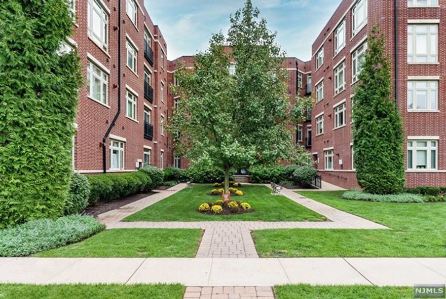 Well maintained unit located at the luxurious M at Englewood South building. Open floor plan, living room leading into dining area. Kitchen features granite counter top and breakfast bar w/ stainless appliances. Nice size master bedroom w/full bath and walk in closet. 2nd bedroom w/full bath and hallway powder room. HOA includes flood insurance, cable/internet, outdoor pool, residents club room. Comes with 2 deeded parking space, 1 garage and 2nd spot deck parking. Assessment ends 2022, seller's will paid off the remaining balance. Complex is in a great location w/ convenient location, right off Route 4, just 5 minutes from GWB and close to NYC transportation. Easy access to highways and minutes away from downtown Englewood w/ a variety of restaurants, shops and more.