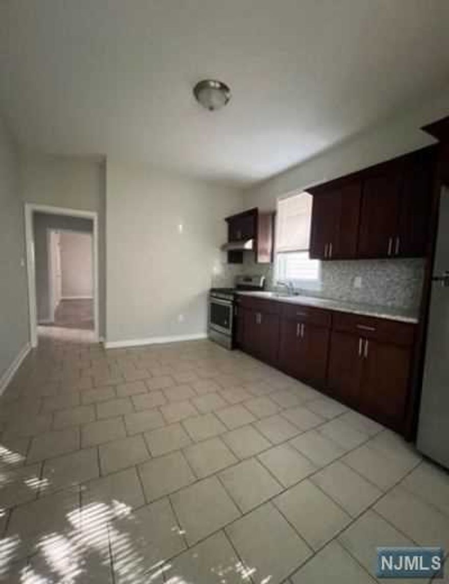 Nice quiet block near transportation. 3 bedroom unit has new floors, SS appliances and granite countertops along with newer windows, renovated bathroom with new tile. Close to transportation, 5 minutes from penn station, 10 minutes from Jersey City and 15 minutes from NYC, bus on the corner takes you straight to Penn station. Close to all schools and the best restaurants in town.