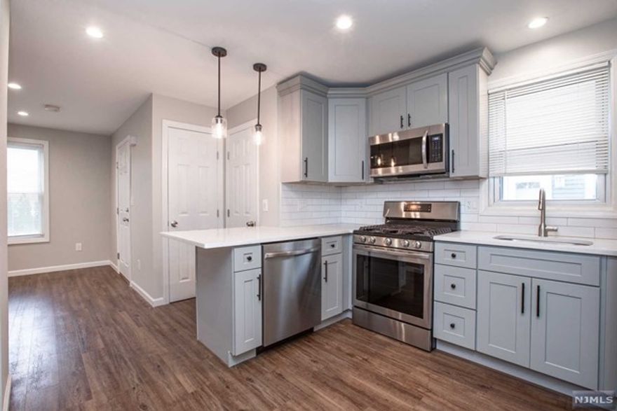 Welcome to this fully renovated 2 bedroom 1 bathroom rental in Nutley, NJ! Enjoy a shared yard, private deck, central AC, and a full unfinished basement with laundry! The bathroom has a tub, and some awesome heated floors! This home is located right by downtown Nutley, and surrounded by multiple parks! This unit also comes with two assigned parking spots! Be sure to book an appointment today before it's gone!