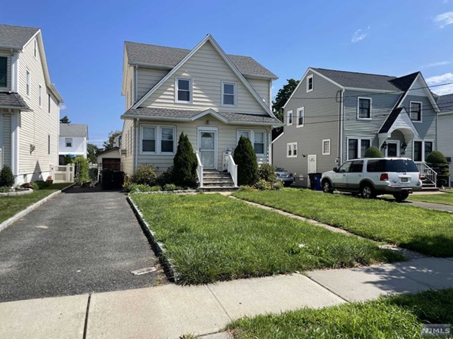 large will maintained colonial style in a quite residential street , 1st floor offering formal living room, formal dinning room, oversize family room with door to back yard , brand new eat-in-kit with new cabinets, grant counter tops , new SS appliances, new ceramic tile, 2nd floor offering , full bathroom with new vanity , Master Bedroom, bedroom, bedroom, full walk up attic for storage, full finished basement with family room, office , full bathroom , laundry room, utility room. long drive way, one car detached garage .