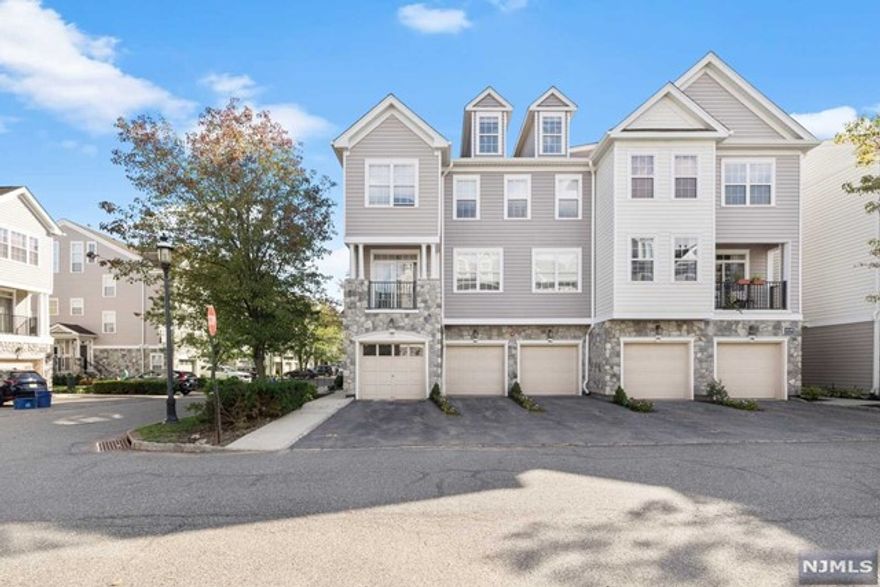 ACTUAL PROPERTY TAXES ARE $8,765! The opportunity you've been waiting for to purchase a multi-level end townhome unit (Summit model) that offers 2012 sqft of living space. It is nestled in a very welcoming gated community, Cambridge crossings, which is ideally situated near major hwys such as GSP, US46, and Rt 3. This 3-level unit offers a cozy gas burning fireplace on the first level, granite counter-tops, and a formal dining room. It has a laundry room conveniently located across the powder room on the first level as well. The second level has two very spacious bedrooms with an en suite for the master bedroom. There is an additional loft on the third level that can be used as a work from home office or additional room. The gated community offers an Association pool, clubhouse, tennis courts, front entrance security and exercise room.