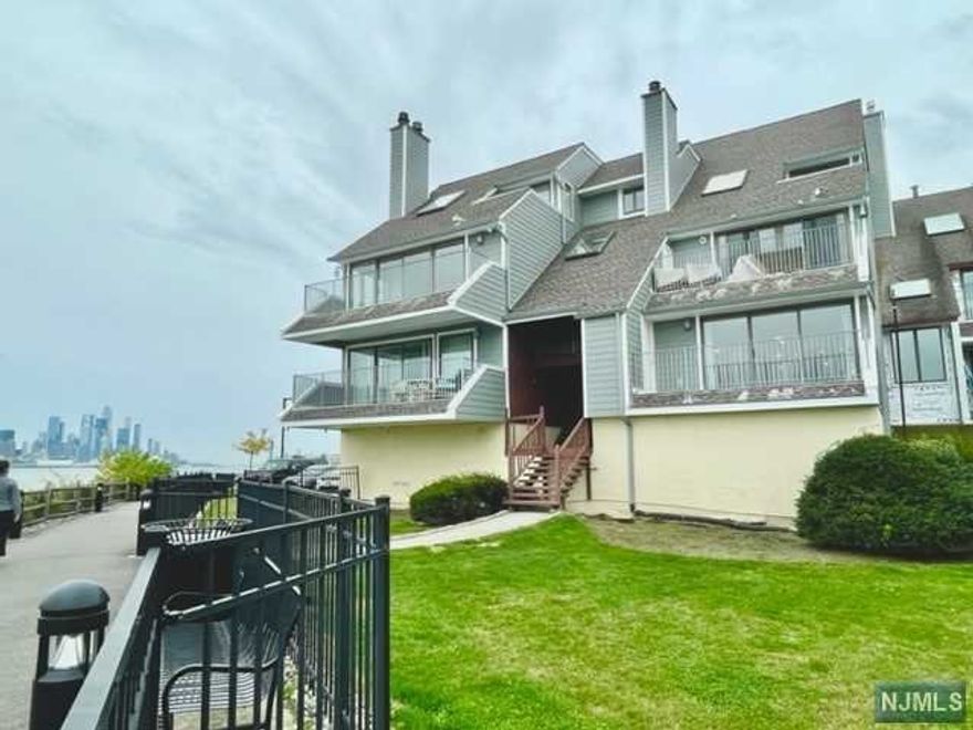 This amazing 2BR, 2Bath end unit condo is situated in the Roc Harbor gated community right on the edge of the Hudson River. This gem is approx. 1617 sqft per tax records and offers waterfront lifestyle living and walkway access in front. It feels like you are right on the water and get-away with an amazing unobstructed Northeast, Hudson River, NYC skyline and botanical garden view from the living room, dining room and kitchen. The unit features XL living rm with a FPL, terrace, a generously sized master BR with a walk-in closet & master bath. W/D in the unit. Self-vacuum system. New flooring, 2-car garage, plenty of parking space, new siding, security gate, pet friendly. A Commuter's Delight; NJ Transit bus, ferry, GWB, Lincoln Tunnel, and Light Rail to NYC. Enjoy all the neighborhood amenities like shops, restaurants,cafes,markets,and parks.Low new Taxes $7200. Roc Harbor residents can use the outdoor pool at the Water Park on Hudson and Half Moon Harbor with a fee and agreement.