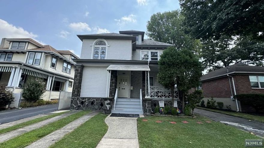 Welcome to the top floor of this charming two-family home, perfectly situated for seamless access to transportation, shopping, and schools. Immerse yourself in the allure of old-world charm with beautiful hardwood floors throughout. This spacious unit features two expansive rooms with access to an oversized attic, ready to be transformed into your dream office, entertainment space, or anything you can imagine. The primary bedroom is incredibly spacious, complemented by a cozy second bedroom. Enjoy meals in the inviting eat-in kitchen and unwind in the full bathroom. The convenience of private in-unit laundry adds to the appeal. Plus, shared use of the driveway for your parking needs. Utilities, landscaping, and snow removal are the tenant's responsibility. This is a no-smoking, no-pets property. At lease signing, you'll need the first month's rent, a 1.5-mo. security deposit, and a 1-month brokerage fee. Don't miss out on the perfect blend of historic charm and modern convenience!