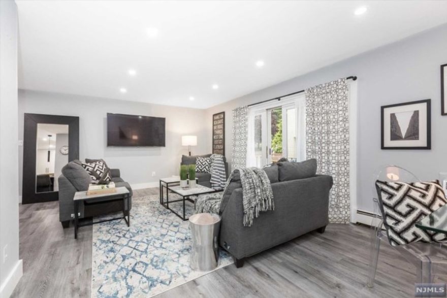 Come experience this chic and sophisticated 1 BR/1BA condo with space and style to spare. Convenient to beautiful Brookside Park, Bloomfield's eclectic dining and shopping scene and major highways. The largest unit in Whitestone Gardens offers 900+ sf of freshly painted living area, a new kitchen with white shaker cabinetry, tiled backsplash, quartz counters & new appliances plus new flooring & lighting throughout. The open floor plan includes a LR, DR & enough room for a flex/office area. The spacious, sunny bedroom with big closet is a winner. The updated bathroom with a new vanity is crisp and neutral. There are sliders to a patio, brand new wall AC unit & interior doors with contrasting hardware. The oversized, deeded garage has sizable shelving/storage options. Laundry available in building.