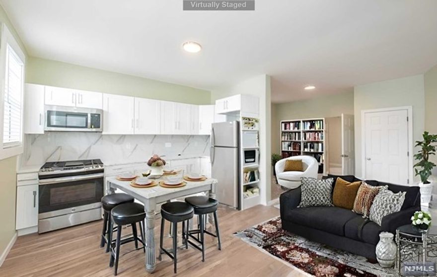 Imagine waking up in a chic, 2-bedroom apartment, with the city's pulse right at your fingertips. You prepare breakfast in a sleek, modern kitchen feeling the anticipation for the day ahead. The vibrant energy of Nutley beckons as transportation options await just mins away. Each evening, you return to a space that is not only intimately yours but also connected to the city's dynamic rhythm. This apartment offers a railroad-style charm offering 2 bedrooms for the price of one! With shared parking that is accessible and maintained, every detail is taken care of. Relish in the exclusive resident benefits with the Woodcroft Restaurant downstairs, making dining an ever-tempting and immediate option. The best of urban living is fused with unique charm, offering an open concept layout, shared parking perks, and two BRs for the price of one. Delight in the highlights of this unique living space.