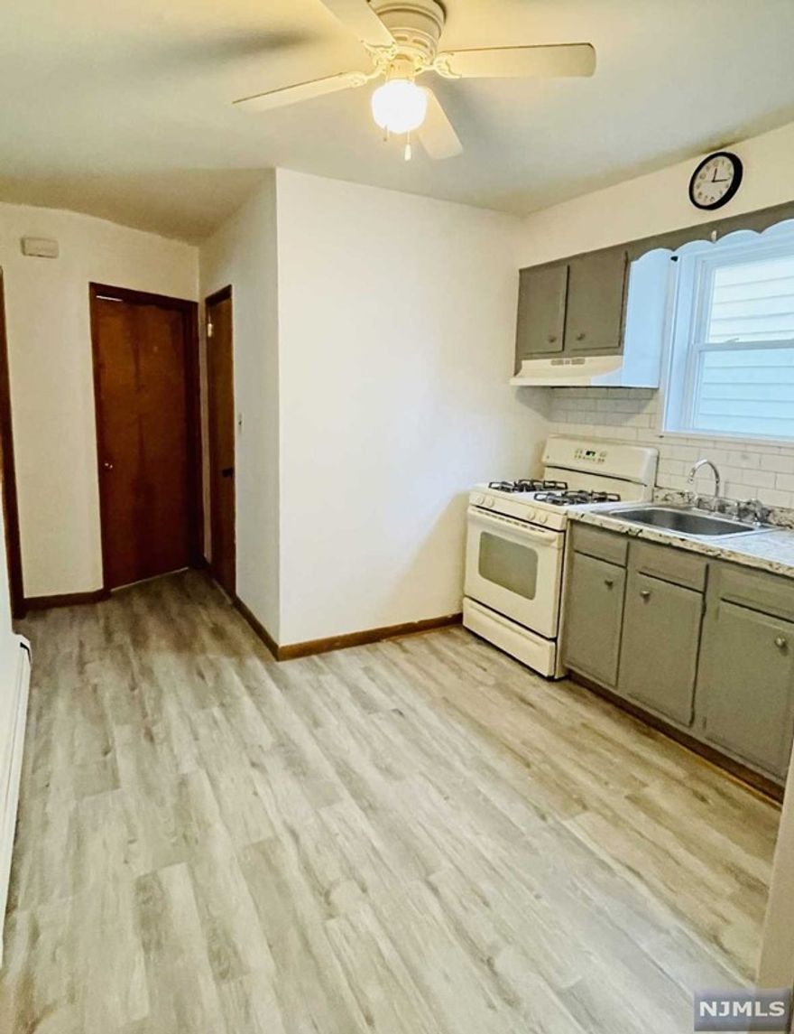 Wonderful freshly painted first floor apartment available for rent in great section of Garfield. Unit features living room, kitchen , two bedrooms and updated bathroom. No pets allowed, street parking only, no laundry in building. Require credit check, proof of income and application. Fantastic location, close to highways, shopping and schools.