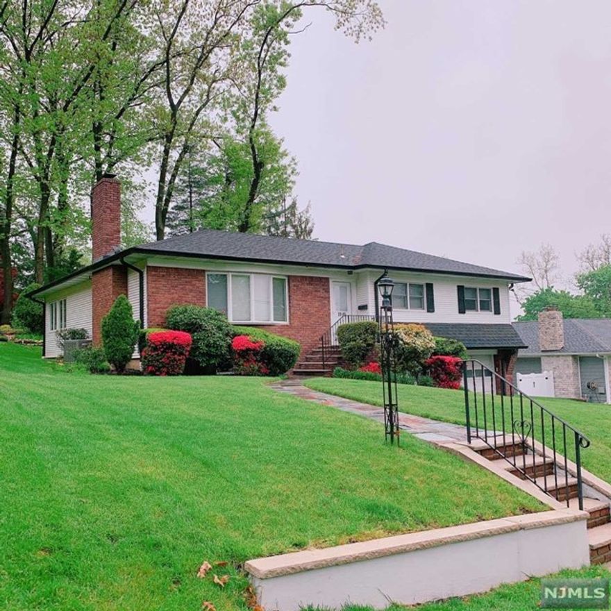 Lovely ranch style house situated on one of the most desirable streets in Fair Lawn. 3 bed, 2.5 bath. Open concept floor plan. Living room with wood burning fire place that leads into dining area and kitchen w/ large granite counter, stainless steel appliances. Primary bedroom w/full bath, 2 additional bedrooms w/hallway full bath. Finished basement: Family room w/ separate bonus room, half bath and laundry room. Attached 2 car garage. Close to NYC transportation.