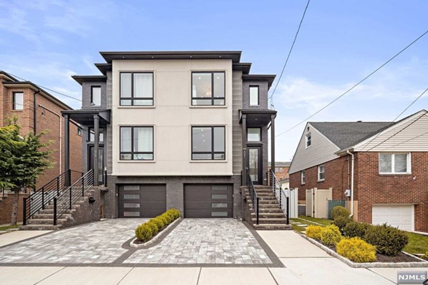 Welcome home to this young townhome in the heart of Cliffside Park. 1st floor offers an open floor plan with 9ft ceilings! The LR w/ gas fireplace and built-ins flow seamlessly into the dining room, which leads you to a half bath and large EIK. Kitchen is equipped with SS appliances and plenty of cabinetry below the oversized waterfall island w built in outlets. Alongside the breakfast area, you have sliders leading to the patio. 2nd Fl offers a Master Suite with plenty of natural light, 3 walk-in-closets and master bath with double vanity and stand up shower. The hallway with skylights leads you to 2 additional bedrooms, a full bath w stand up shower/tub and washer/dryer.Ground Level offers access to the 1 car garage, additional storage, a recreational room with a full bath! Sliders lead to the patio/enclosed yard with pavers. Close to transportation, shopping, eateries and much more! Make this house your home!!