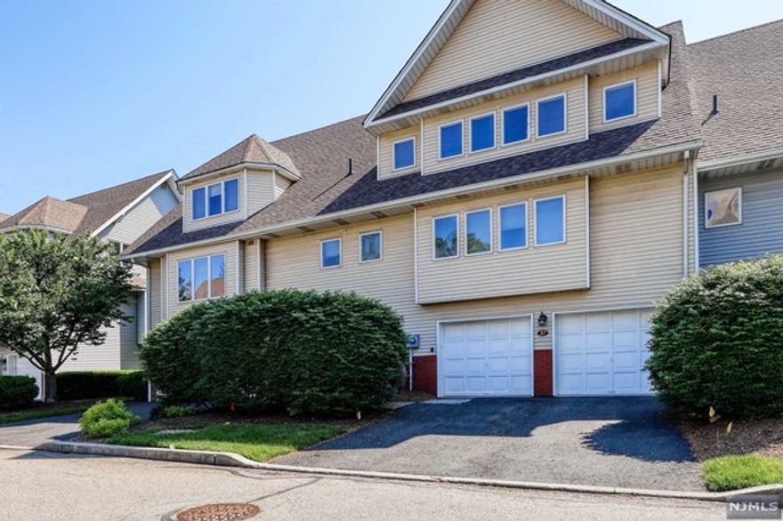 **************BEST AND FINAL DUE 6/9 THURSDAY 5PM************Sought after Iris Park Townhomes in Glen Rock. Hardwood throughout the unit. 2 story living room with lots of windows, wood fireplace and deck. Half level up you will find a spacious eat in kitchen with walk in pantry and either formal dining room or 3 rd bedroom with walk in closet and shower bathroom. On the top floor you will find a hhuge master bedroom with 21 sink master bathroom and shower and walk in closet along side 2nd bedroom with itw own bathroom and walk in closet and laundry. Ground level has a family room that is carpeted which can be used as office as well. 2 car garage. Great town great schools. Community room for parties included in miantencance.