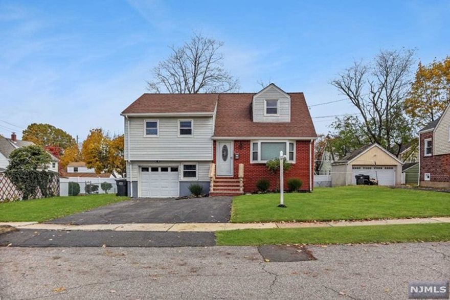 Newly renovated Split level on a quiet street in Bergenfield NJ. This 3bed/1 bath home is situated on a large 80x100 lot, within walking distance to schools, shops and transportation to NYC. Gorgeous finishes including new floors throughout, completely remodeled bath, new appliances (Refrigerator, Range, washer, dryer), new garage door and light fixtures. Unpack your bags and move right in! Seeking 2-3 month lease.