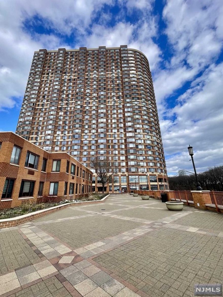 Luxury HiRise-- The Palisades-- Wonderful North East Views of GW Bridge & NYC!! The Heights Model-"15 Line"- One Bedroom Apt w 877 sqft (As per Landlord). Updated Apt with brand new wood flooring, new tiling in entry foyer, updated bathroom, new microwave, dishwasher, fridge, washer/dryer - New HVAC too! Lots of Closets!! Very Bright & Spacious! Available May 1st. Pets Considered! Rent includes 1 Garage Parking Space and In-Unit Laundry. All Amenities: Health Club, Outdoor Pool, Barbecue Area, Valet, Playroom, Drycleaners, & more. Easy NYC Transportation! Come and See!!