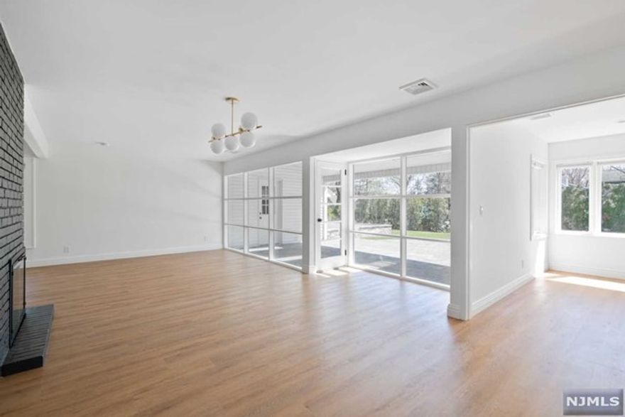 "For Rent: Newly renovated 3 bedroom, 2 full bathroom house located on a quiet street in the desirable town of Ridgewood! With floor to ceiling windows, this light and airy home has natural light pouring in from every angle. The first floor flows from a kitchen with stainless steel appliances and quartz countertops to an open living room with a double corner fireplace and a den. The living room leads right out into a covered patio with access to a two car garage. The first floor continues to a primary bedroom suite, a second bedroom and full bathroom. On the second floor, there is another bedroom, office and storage room. This home has a spacious backyard with an additional uncovered patio perfect for entertaining guests all summer long! Home is near transportation, shopping, parks, schools, and worship.