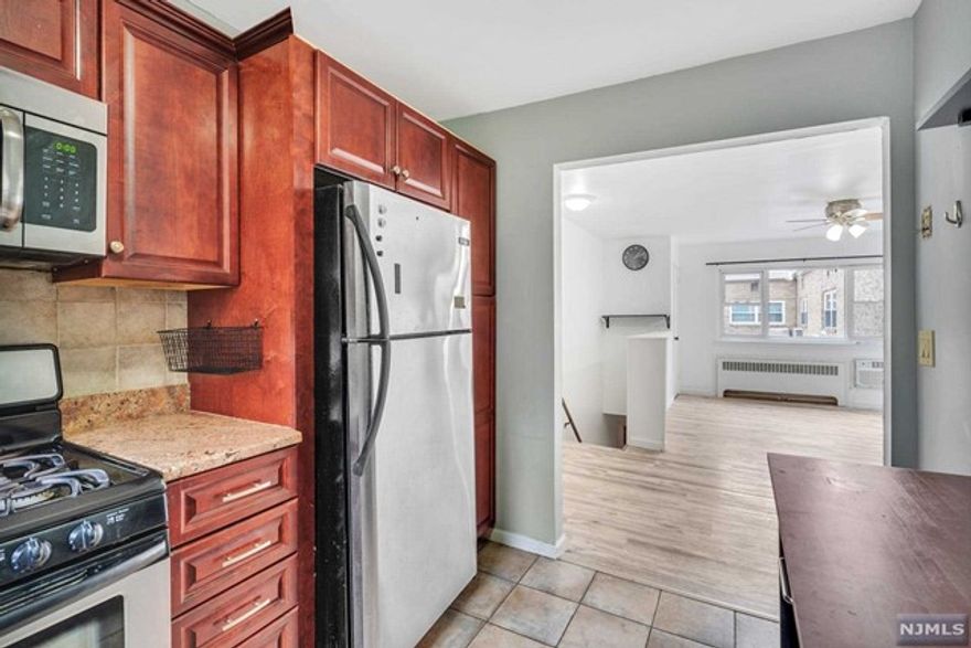 Stunning two-bedroom condo that is ready to move into and has the convenience of being close to JFK Boulevard with its stores, restaurants, and nearby light rail station with access to NYC. The apartment has 2 spacious bedrooms, an open-concept living and dining area, and a kitchen with stainless steel equipment. The apartment building contains a laundry facility onsite that is paid via coin or phone app. There is a designated garage parking spot that might be available a few months into the lease for an additional $200 / month. Owner is currently using it for storage.