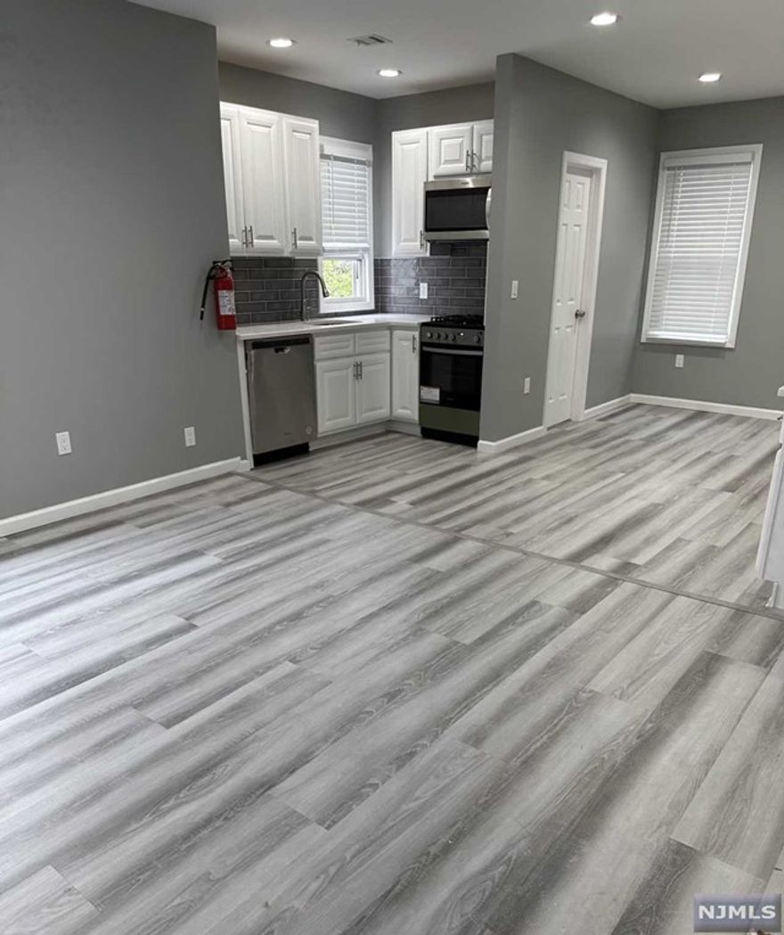 Beautiful 2nd floor unit in multi family house. Fully renovated unit with eat in kitchen, living room, stainless steel appliances, new cabinets with full bathroom! Potentially 2nd bedroom in walk up attic with additional storage and additional living room space. Laundry in unit. No Pets, No Smoking. Street parking, Great location. JUST MOVE RIGHT IN AND ENJOY!