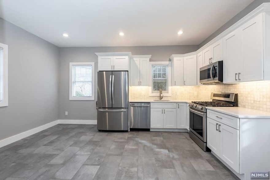 FULLY RENOVATED TWO BEDROOM APARTMENT IN WONDERFUL MAHWAH. TONS OF AMENITIES FOR THE PRICE FOR THIS 2 FAMILY APARTMENT WITH THE COVETED SIDE BY SIDE LAYOUT. THE FIRST FLOOR HAS A LARGE EAT IN KITCHEN WITH BEAUTIFUL WHITE CABINETS, QUARTZ COUNTERTOPS AND ALL NEW STAINLESS STEEL APPLIANCES. THE LIVING ROOM IS SPACIOUS AND HAS A WORKING FIREPLACE FOR THOSE COZY WINTER NIGHTS. YOU ALSO HAVE ACCESS TO THE SHARED COVERED PORCH AND A POWDER ROOM FOR CONVENIENCE. UPSTAIRS TWO NICE SIZE BEDROOMS WITH GOOD CLOSET SPACE SHARE A FULLY RENOVATED BATHROOM. THE BASEMENT PROVIDES EXTRA STORAGE AND A WASHER/DRYER. NEW CENTRAL A/C, USE OF THE LARGE ACRE PROPERTY, TONS OF PARKING, SET BACK OFF OF THE STREET FOR PRIVACY AND THE LANDLORD MAINTAINS ALL THE LANDSCAPING AND SNOW REMOVAL. HURRY AND GET THIS ONE BEFORE IT IS GONE. NO SMOKING. NO PETS. TENANT RESPONSIBLE FOR THE FIRST $150 OF REPAIRS.