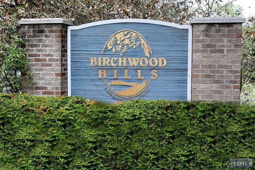 Welcome to the desirable Birchwood Hills community. Open floor plan features 2-story family room, living room, dining room, powder room and garage entrance. Updated kitchen with white cabinets, granite counters, breakfast bar, stainless appliances and sliders to large deck. Second floor with primary bedroom w/vaulted ceiling & terrace, 2 walk-in closets and primary bath, 2 additional bedrooms, Full Bath and Laundry Room. Full finished walkout basement with new carpeting creates great space for home office & entertainment. Updates include newer bathroom vanities, CAC, furnace and garage door. Fabulous community with clubhouse, pool, kiddy pool, tennis ,pickleball courts, playground and exercise room. This pet friendly complex is close to schools, library, shopping, highways, county parks and NYC transportation. Low taxes and great schools.