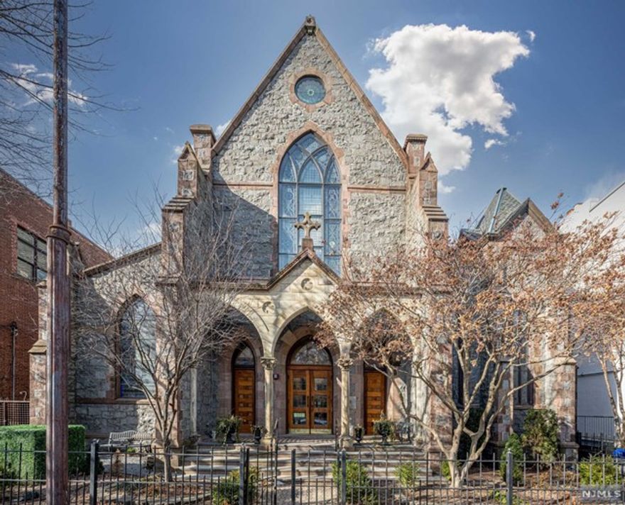 Own a piece of the history. Constructed in the 1890's The Abbey was home to the historical St. Paul Episcopal church. The fabulous 1 bedroom, 1 bath unit boasts Versailles style parquet wood flooring and 13ft. tall ceilings. Entertain guests in the spacious, airy living/dining area with beautiful, stained glass French doors, which opens onto a full length, sun-drenched, deeded private patio. The spacious bedroom has ample closet space and the bathroom features modern fixtures. The state-of-the-art central air system is warranted, and the monthly maintenance includes a deeded off-street parking space located on 4th and Hudson. Close proximity to fabulous shopping, restaurants, the beautiful Elysian Park, the waterfront and transit, including PATH and ferry service to NYC.