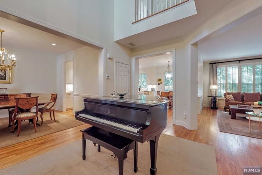 Please call listing agent, Catherine E Mulvey 201-232-2931 for all showings. This USR luxury 3 bedroom, 2 1/2 bath townhome is better than new with soaring, 2 story foyer and open floor plan. The home has hardwood floors throughout. Designer, white eat-in kitchen with butler's pantry and storage pantry. High-end, stainless steel appliances, marble countertops, and island with seating. Large dining room for entertaining. Living room with gas fireplace. Primary bedroom with California walk in closet. Primary bath has soaking tub, separate shower, toilet room, and linen closet. Located in desirable USR with its top-rated schools, parks, and community. Low maintenance living. Easy access to NYC. Only unit available in Orchard Hill.