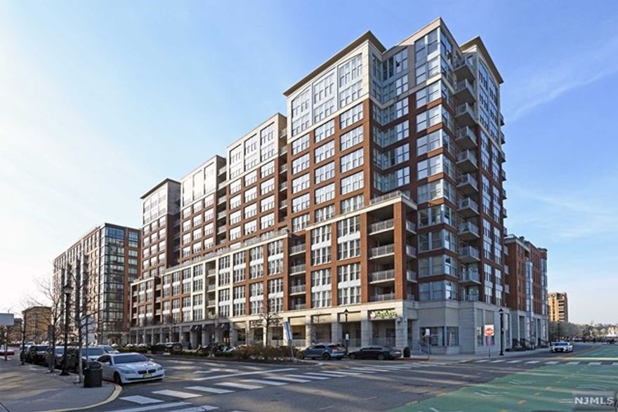 Welcome home to this one of a kind North-East facing 2bd+den/2.5ba/1915sqft corner unit with direct skyline views from each room in addition to your private balcony. The large open concept living area is perfect for entertaining with a Chef's kitchen overlooking the living room & formal dining room, a working fireplace, and custom window treatments. Open style chef's kitchen features granite counters, breakfast bar, ss appliances and custom cabinets & back splash. The two large bedrooms each come with their own spa like ensuites and custom closets. The den can be used as an office or nursery. The luxury Maxwell Place community offers 24/7 concierge service, gyms, 2 outdoor pools, jacuzzi, theater room, yoga room, newly renovated community rooms, shops on premises and shuttle service to and from the PATH. Conveniently located near NYC water Ferry, bus stop, and all that uptown Hoboken has to offer.