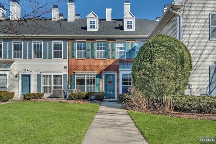 Enjoy all Bergen County has to offer with LOW taxes in a wonderful town with excellent schools, access to highways and so many more amenities! This gorgeous townhouse is perfectly placed within the development; just across from the playground, clubhouse and pool! On the first floor you'll find a large Living Room w/gas fireplace, EIK, DR, powder room and storage room/closet. Upstairs is a large primary bedroom with full bath and two closets, a generous sized 2nd BR and a full bath. Convenient upstairs laundry, pull down stairs to the attic storage complete the second floor. Every room offers natural light especially on sunny days! Central air conditioning, a newer furnace and hot water heater! Come take a look!