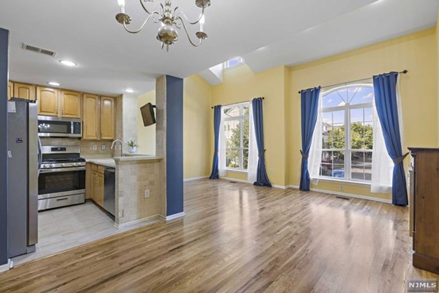 Welcome to Hickory Manor! This stunning townhome has 2 spacious bedrooms and 2.5 baths. The open floor plan on the first level makes entertaining a breeze, seamlessly connecting to the kitchen, the formal dining area, and the inviting living room. Flooded with natural light, the living area showcases a two-story vaulted ceiling. The upper level has a spacious loft, an ideal dual-purpose space for a family room, den, or home office. The expansive master suite is complete with a walk-in closet, balcony, bathroom with a soaking tub, double vanity, and shower. Recent renovations include new appliances, an updated half bath, and a marble-tiled entryway. Other features include ample closet space, convenient second-floor laundry, and a 1-car garage with shelving. Unique to the community, this home enjoys unobstructed views of the community entrance from Vauxhall Road to Rabkin Park in the rear. Hickory Manor has a sparkling outdoor pool and clubhouse, and the community is pet friendly!