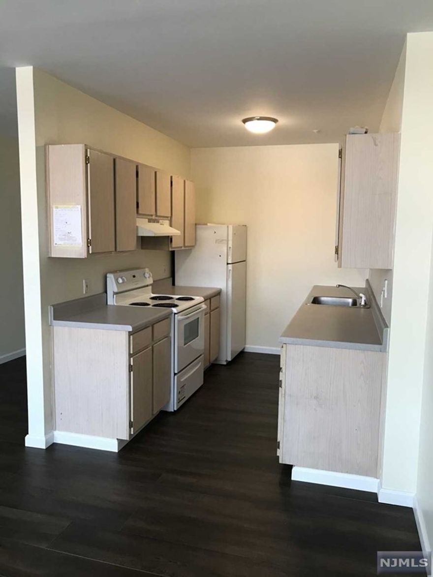 1 Bedroom apartment available on 2nd floor of elevator building. Apartments over the stores at Washington Commons Shopping Plaza adjacent to StopNShop. Vinyl flooring. Galley kitchen with lots of cabinets, dishwasher and electric stove. Bathroom with shower over a tub. Washer and Dryer in unit. Onsite Parking. NO smoking of any kind, no pets.