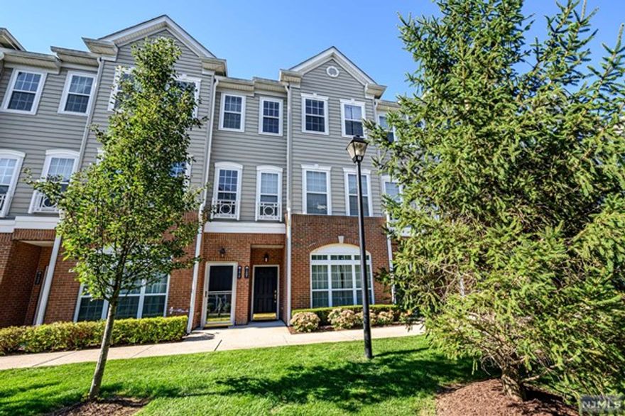 City Homes at Essex Park premieres this luxurious 3 Bed 2.5 Bath Townhome with 1 Car Garage & Master Suite, completely move-in-ready & waiting for you! Beautifully maintained with modern upgrades all through, step in to find a spacious & distinctive floor plan that is sure to impress. The main lvl features gorgeous cherry HW flrs, a crisp modern palette & plenty of natural light throughout. Open Living/Dining combo holds French Doors to your own private Balcony. Upgraded designer Eat-in-Kitchen offers sleek SS Appliances, granite counters & delightful breakfast bar. Convenient 1/2 Bath, too! Upstairs, the main Bath, convenient Laundry rm + 3 generous Bedrooms, inc the Master Suite! MBR boasts it's own WIC, raised ceiling & ensuite bath with dual sinks, glass stall shower & jacuzzi tub- wow! 1 Car Garage with shelf storage is an added bonus. All conveniently located to GSPWY, NJ Tpke, 20-30 mins to NYC & an easy commute by Rail, Path Train & Bus Service - a commuter's delight!