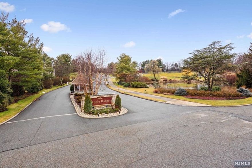 Welcome to Apple Ridge - Mahwah's premier gated townhouse community! Luxurious 3 story end unit faces south, filled with sunshine & warmth. Fabulous 2 story entry foyer has access either by attached garage or charming garden area with new deck. The open floorplan flows seamlessly from den/office to kitchen to oversized multi function living room - which also has a fireplace & outdoor access to a large new private deck. The 2nd floor has a large bedroom suite featuring oversized bath w/jetted tub, generous closets & new private balcony. Also a 2nd bedroom, hallway full bath w/laundry. 3rd floor landing overlooks entry foyer, 3rd bedroom has great closet space, separate heat & A/C zone perfect for teen suite or office. Home has many updates throughout including multi zone heat & A/C, 3 brand new decks, huge unfinished basement w/high ceilings. Parking for all amenities, Clubhouse w/fitness center, tennis, playground, pool, 24hr security. Make it your home today!