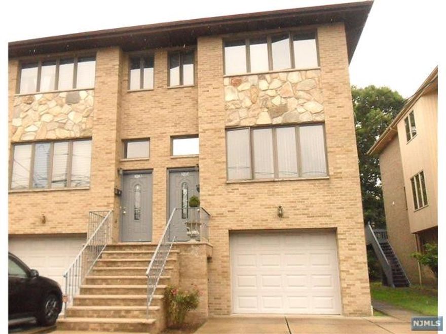 Updated spacious kitchen & bathrooms. Well maintained & bright duplex. Hardwood floors throughout. Finished Ground floor with separate entrance. Close to Elementary School #3, public transportation, shops & parks. No pets. NTN report & income verification required.