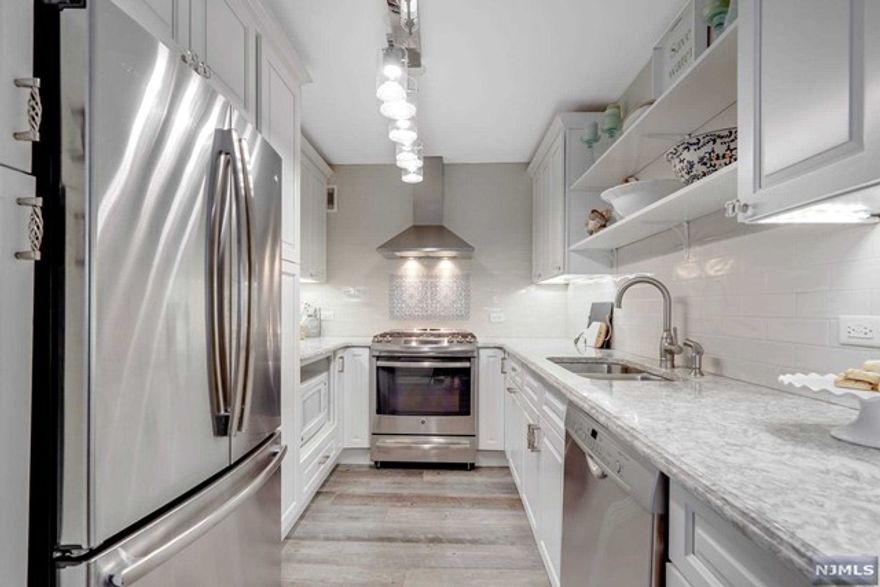 Welcome To The High Life. Start your day with a blue sky. There are thirteen windows facing northwest with panoramic views of Manhattan, the Hudson River, mountains, and rooftops. Modern-day living is made easier with spacious room proportions. Storage space is abundant here. In addition to the large entry closet, there is a double wide walk-in closet with barn doors. Newly renovated, this home features Hunter Douglas&reg; window treatments, chrome fixtures and lighting, wide-plank faux hardwood ceramic floors, solid core doors, Emtek&reg; crystal doorknobs, a California kitchen, four zones of central heating and cooling, and an abundance of storage space. Each bathroom has personality. The spacious powder room walls are wallpapered in black vinyl wallpaper. The full guest bathroom has a modern enclosed glass shower. Marble is used for the basin countertop. Visit www.thegalaxytowers.com Call me for full details. Phone number is 917-375-2932.